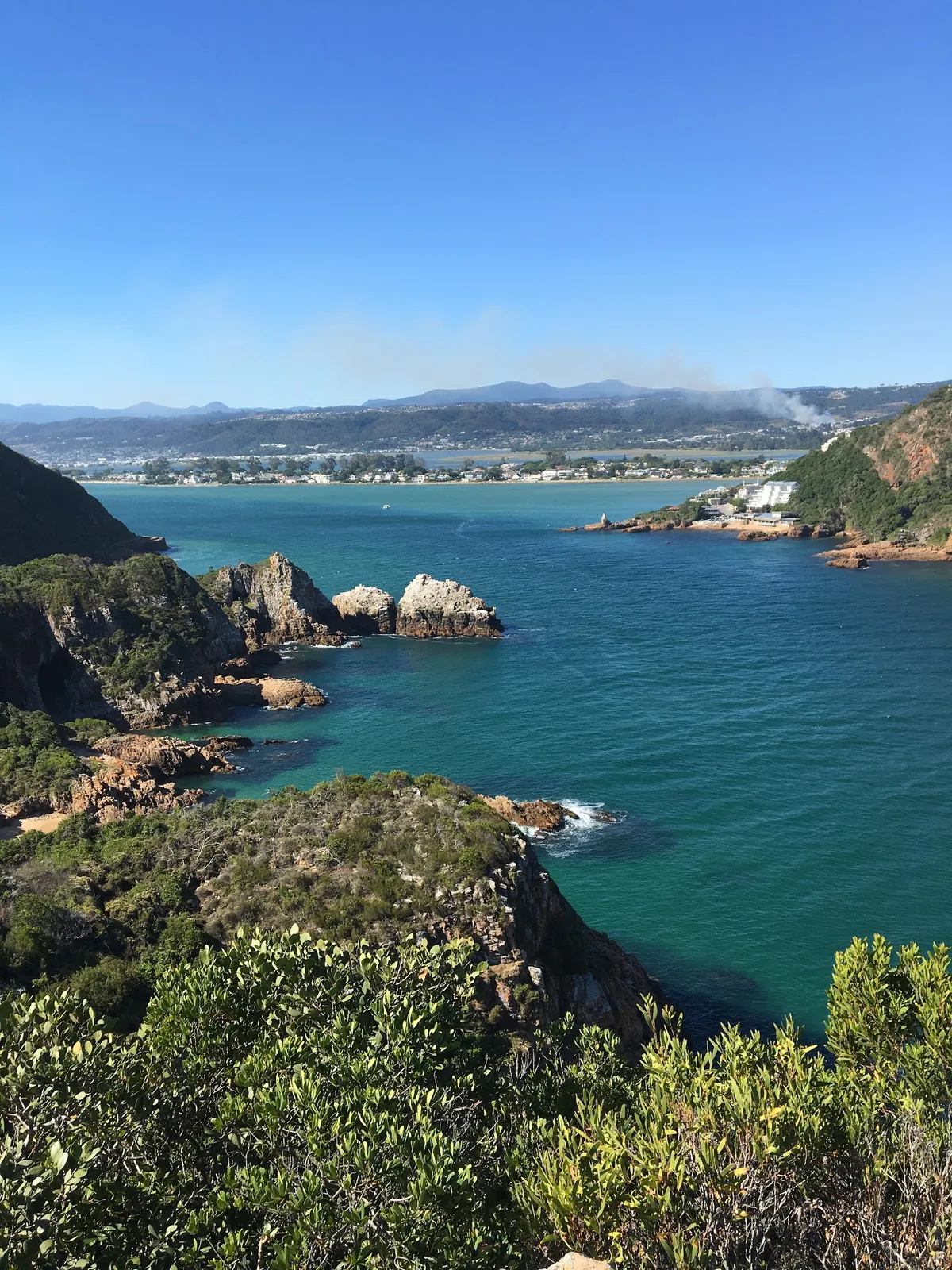 Elevated view from the Featherbed Nature Reserve on the Western Head, over the Knysna lagoon mouth and town
