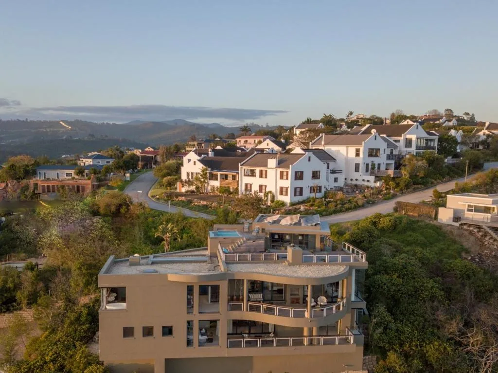 Aerial view of modern villa overlooking Knysna lagoon and mountains