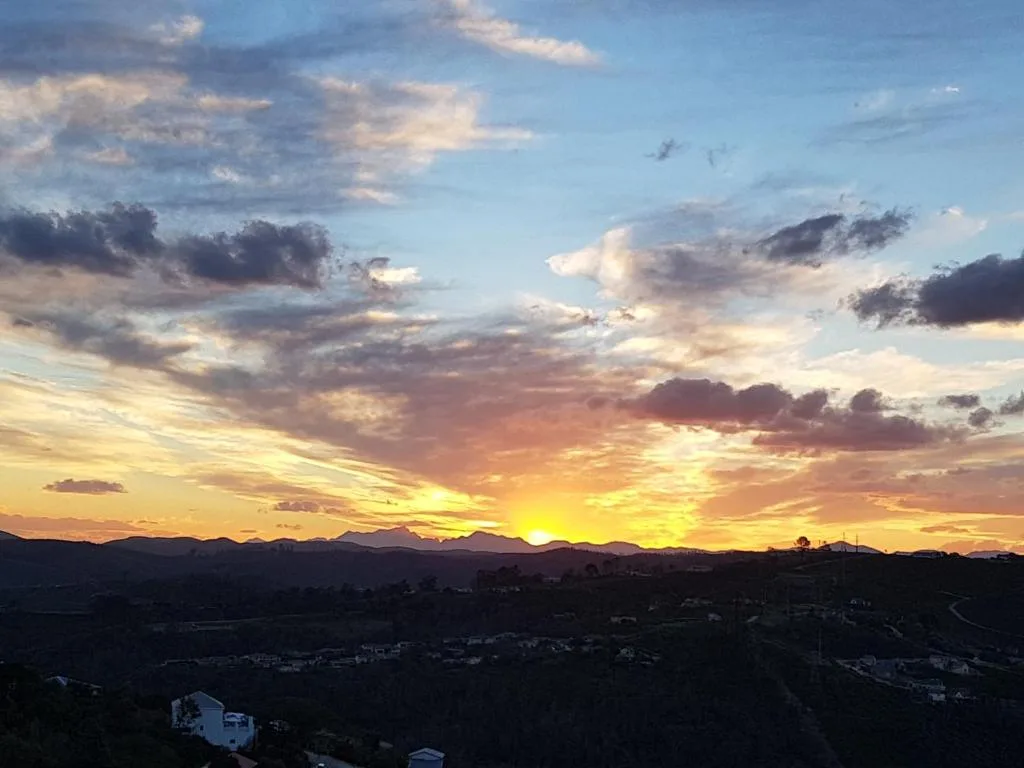 Stunning sunset over Knysna mountains and valley landscape