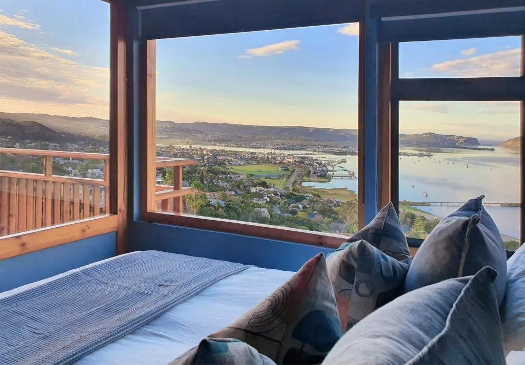 Stunning lagoon vista from bedroom window, mountains and water beyond