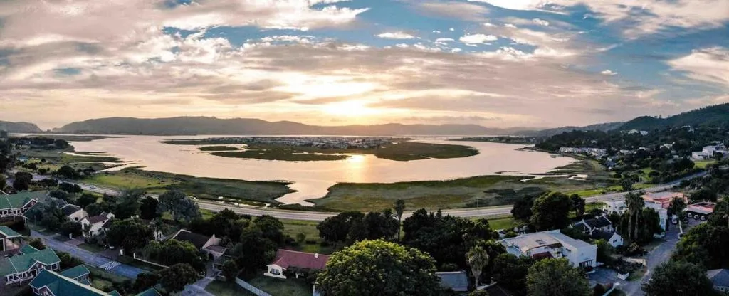 Scenic lagoon and mountain landscape at sunset, Knysna aerial perspective