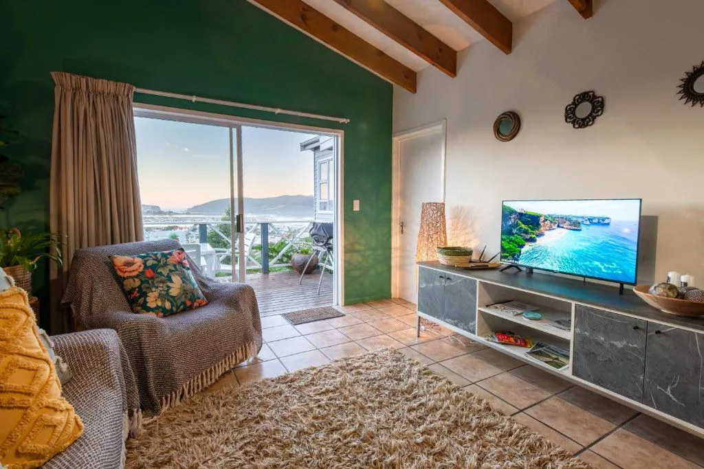 The League Knysna 6-sleeper — lounge with lagoon view, walk to Knysna Waterfront