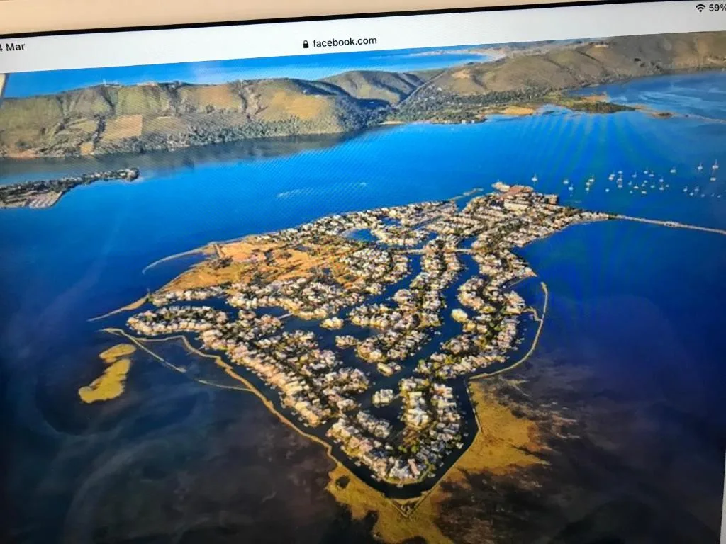 Aerial view of Thesen Island in Knysna with lagoon and surrounding mountains