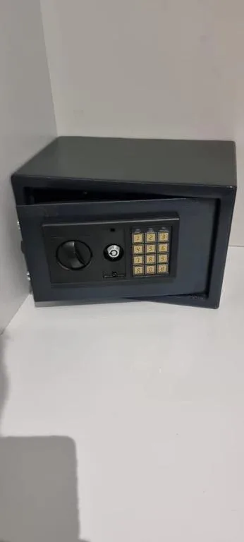 Black digital safe with keypad lock and combination dial