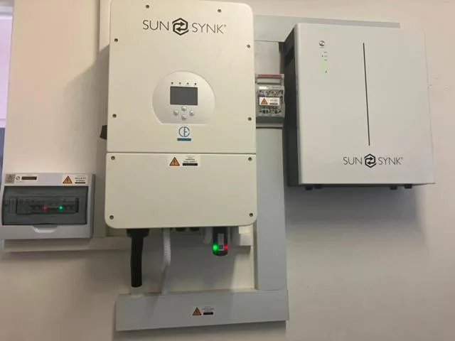 Solar inverter and electrical system equipment mounted on white wall