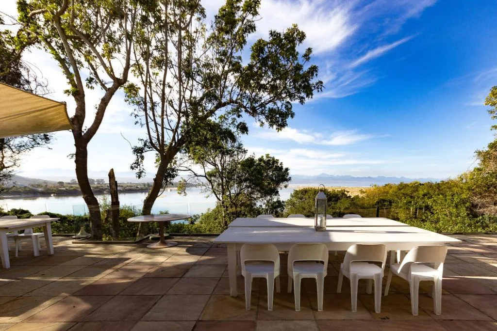 Scenic lagoon and mountain views from expansive waterfront deck area