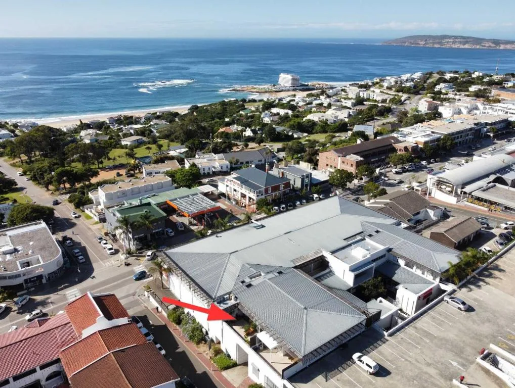 Aerial view of Plettenberg Bay beachfront town and sparkling Indian Ocean