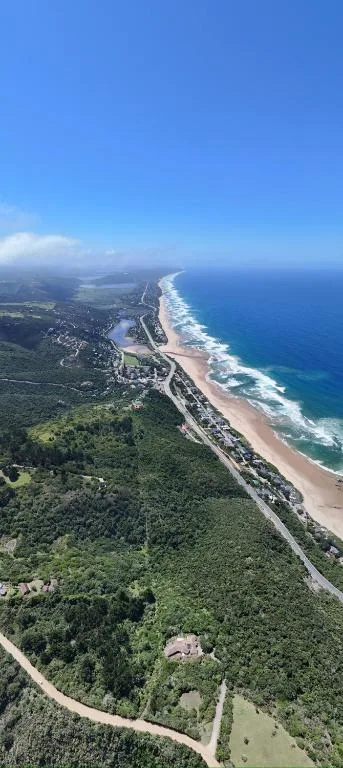 Aerial view of Wilderness beach, lagoon, and surrounding coastal landscape